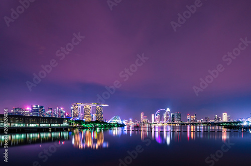 SINGAPORE-MAY 18  2019   Cityscape Singapore modern and financial city in Asia. Marina bay landmark of Singapore. Night landscape of business building and hotel. Panorama view of Marina bay at dusk.