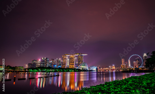 SINGAPORE-MAY 18  2019   Cityscape Singapore modern and financial city in Asia. Marina bay landmark of Singapore. Night landscape of business building and hotel. Panorama view of Marina bay at dusk.