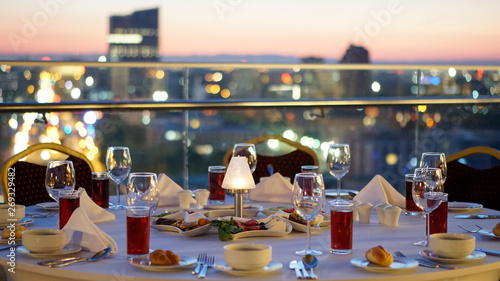 fancy sunset table on roof tea time