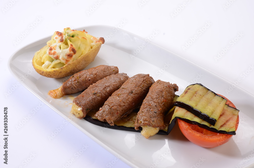 rolled beef with cheese stuffed served with rice rolled beef with cheese stuffed served with rice