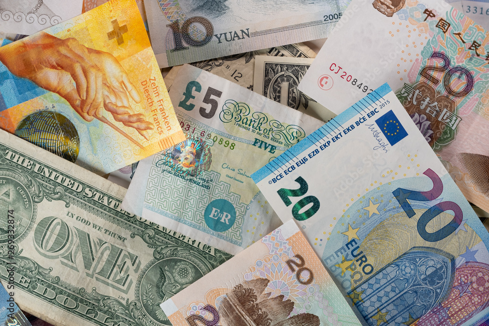Obraz premium Mix banknotes different currencies