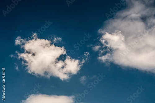 white cloud on air clear blue sky weather background. high contrast © Kaptannyy Kostyantyn
