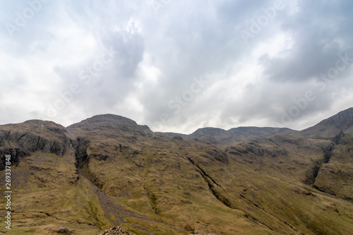 View of Lingmell and Scafell Pike with Dramatic Grey Clouds, Lake District, England, UK