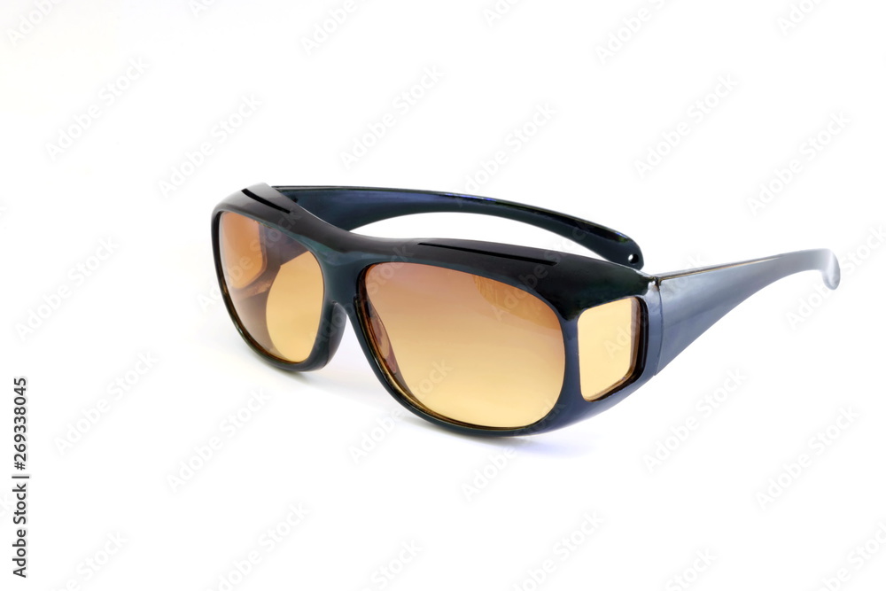 Close to the sunglasses on a white background. Close to the sunglasses on a white background.
