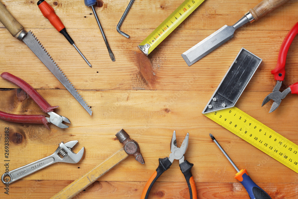 Working tools on wooden rustic background with copy space Working tools on wooden rustic background with copy space
