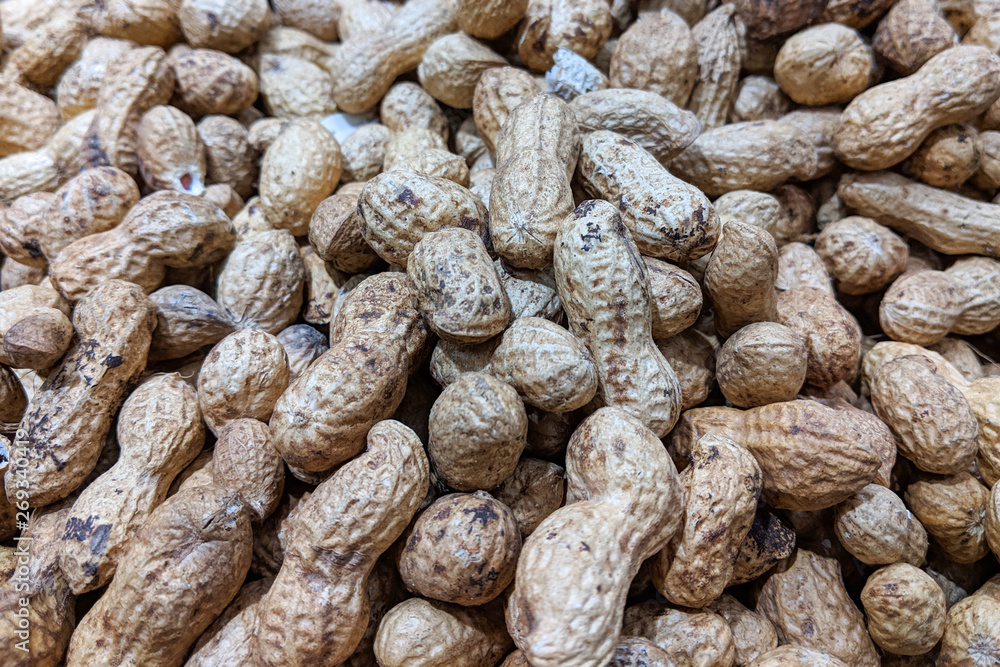 Peanuts with shell. Macro food photo close up from above, background. Peanuts with shell. Macro food photo close up from above, background.