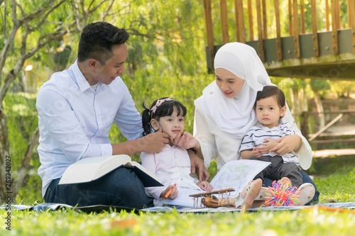 Malay family at recreational park having fun