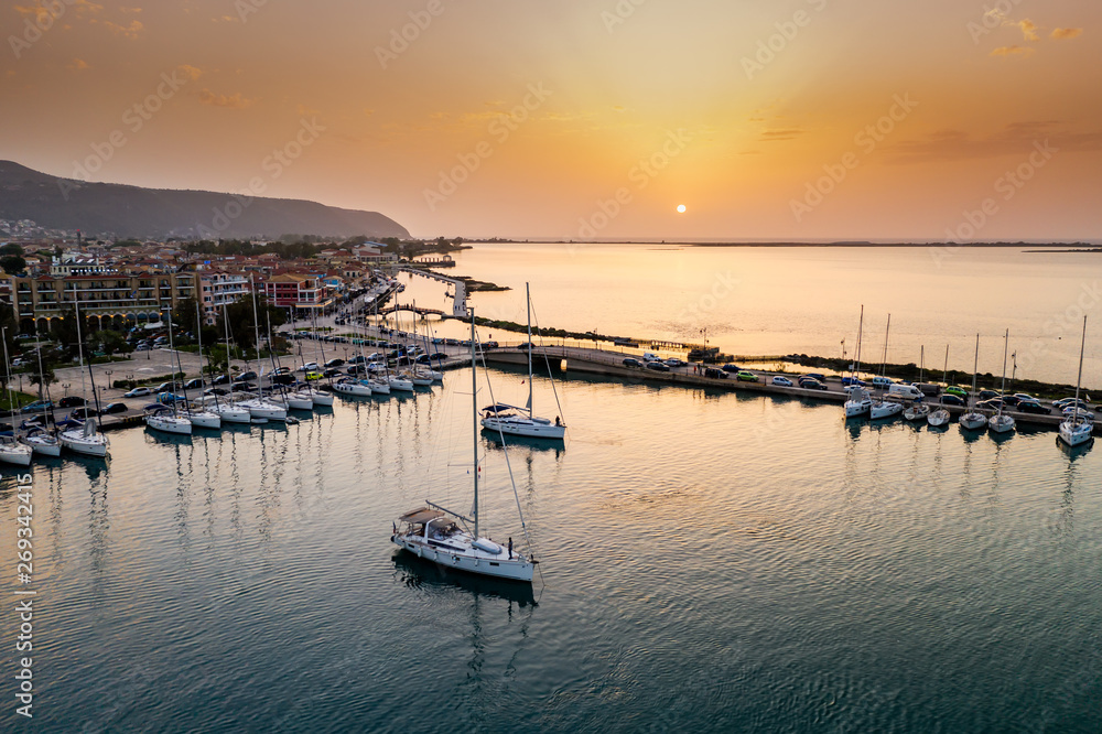 Sailboats in the marina and the city of Lefkada island, Greece