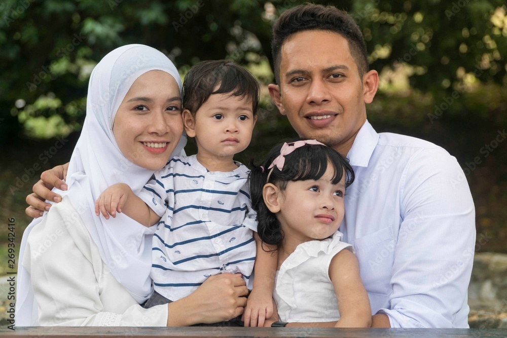 Malay family at recreational park having fun Malay family at recreational park having fun
