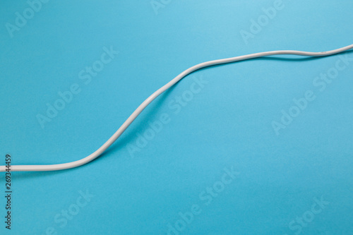 white power cable socket on blue background