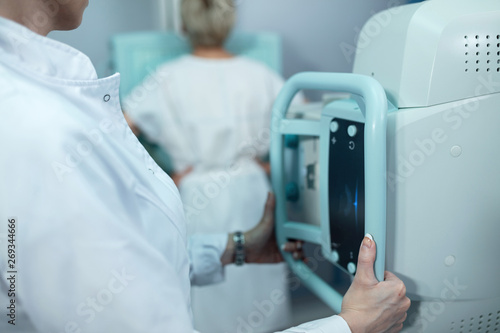 Wallpaper Mural Close up of doctor scanning a patient with medical X-ray. Torontodigital.ca