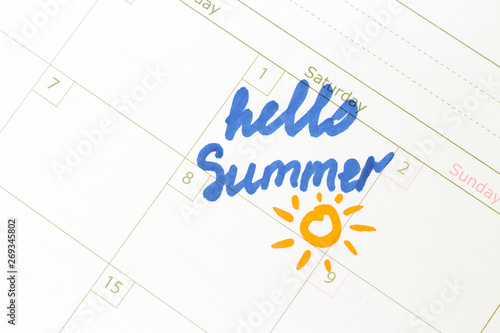 Inscription hello summer in the calendar, close up