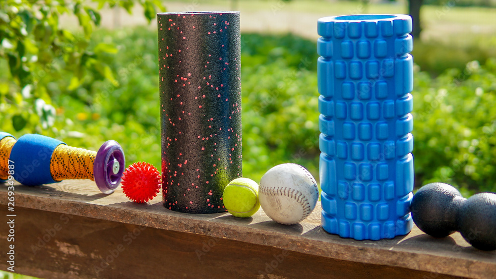 Fascia training - massage balls, roll and other body roll recovery. Self  myofascial release for trigger zones Photos | Adobe Stock