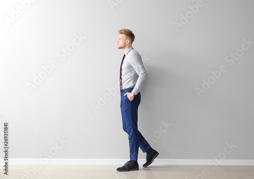 Fashionable young man near ...