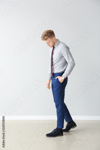 Fashionable young man near ...