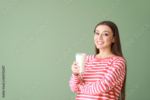 Beautiful woman with glass ...