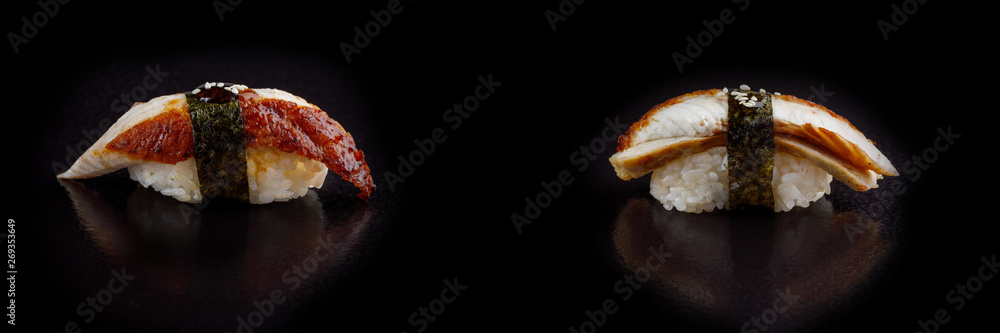 Classic sushi roll. Sushi at black background.Japanese seafood sushi , sushi a black background. Classic sushi roll. Sushi at black background.Japanese seafood sushi , sushi a black background.