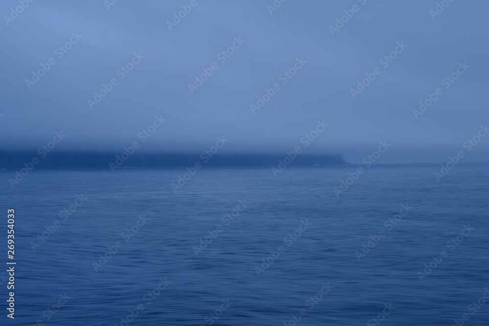 Ver misty, early morning in Milford Sound Ver misty, early morning in Milford Sound