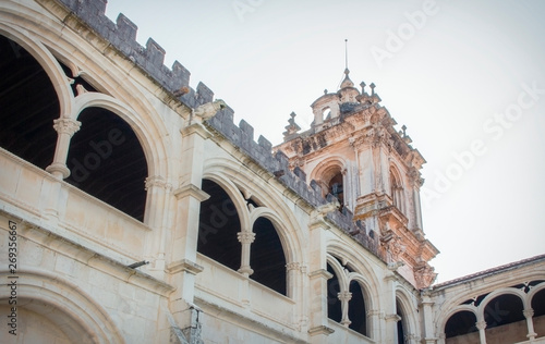 Bottom view from the cloister of the Alcobaca Monastery and the baroque tower.