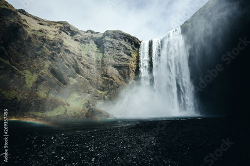Amazing view of popular tourist attraction. Location Skogafoss waterfall, Iceland, Europe.