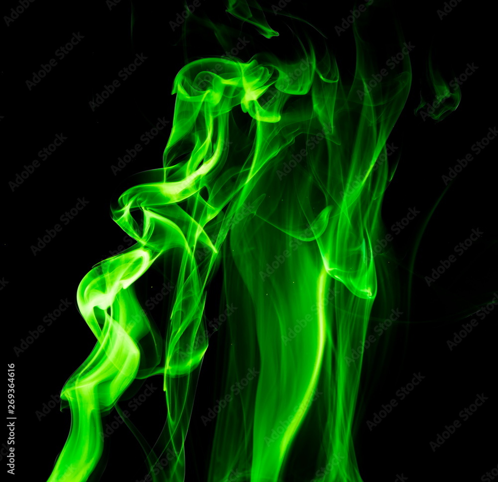 Green smoke on black background Green smoke on black background