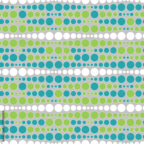 Colorful uneven bars of dots vector seamless pattern. Multicolored round spots texture abstract geometrical background for fabric, wallpaper, scrapbooking projects or backgrounds.