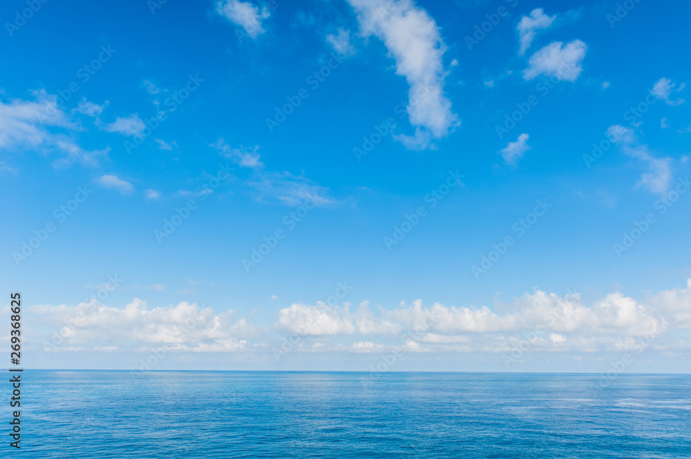 Pacific Ocean - View of beautiful sky with clear blue sea Pacific Ocean - View of beautiful sky with clear blue sea
