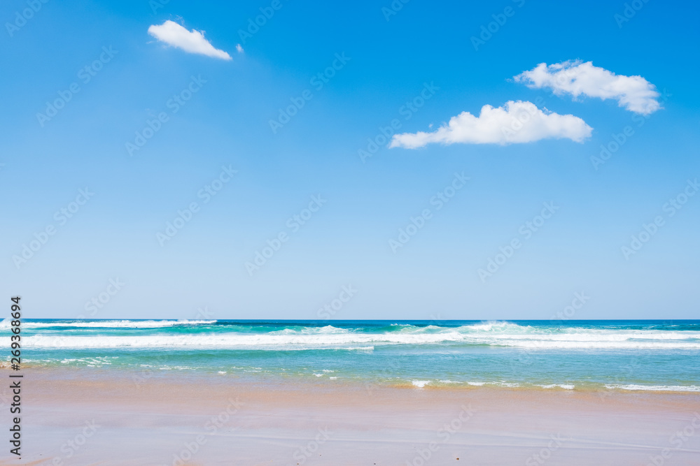 Beautiful beach and tropical sea and blue sky