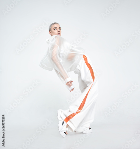 Futuristic lady bending back and looking away