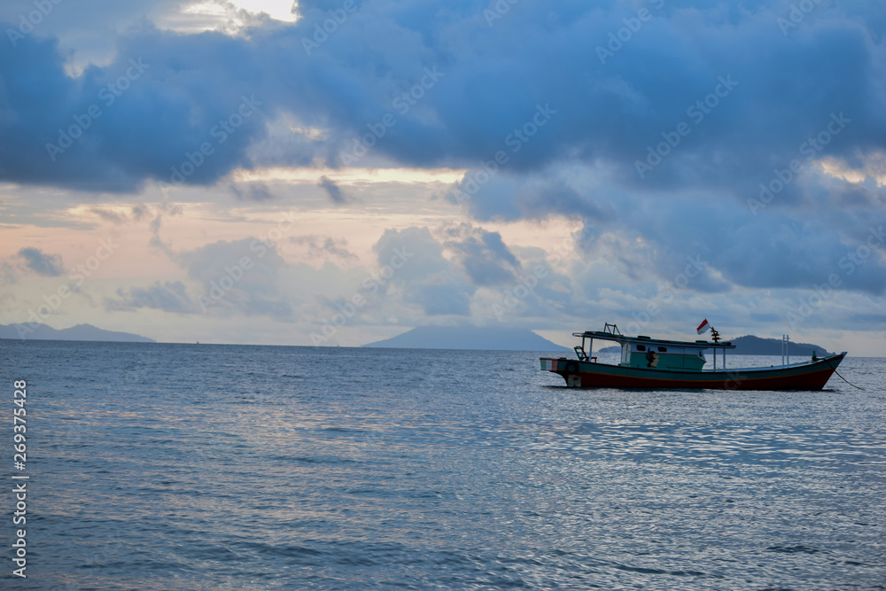 traditional fishing wooden boat near pahawang island. Bandar Lampung. Indonesia. Traveling concept. Upload at Lampung, Indonesia in March 2019. traditional fishing wooden boat near pahawang island. Bandar Lampung. Indonesia. Traveling concept. Upload at Lampung, Indonesia in March 2019.