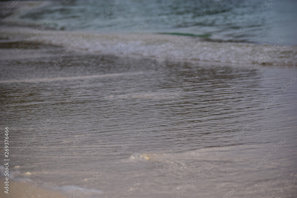 beach blurred abstract background shoreline close up stylized - sebeach blurred abstract background shoreline close up stylized slective focus on sand