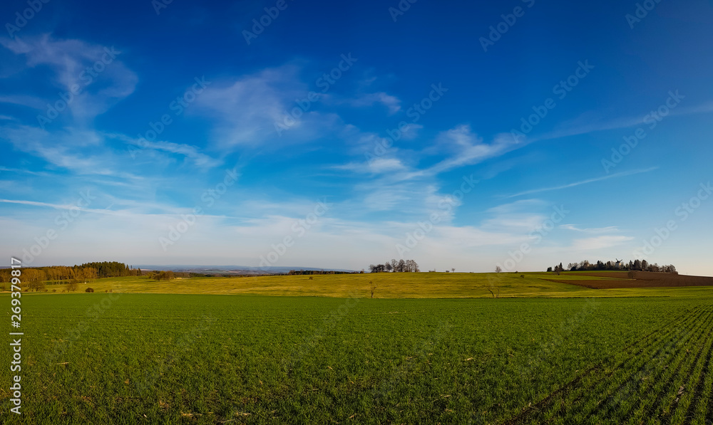 scenic panorama view of natural landscape under a cloudy sky