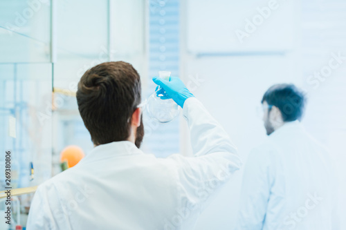 Scientist researcher working on new solution in a modern laboratory