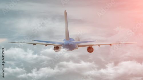3D rendering of a commercial airplane on flight over the clouds