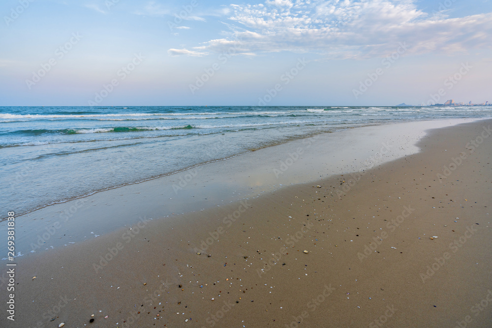Beautiful Tropical Beach Hua Hin, Prachuap Khiri Khan Province, Thailand. blue ocean background Summer view Sunshine at Sand and Sea Asia Beach Destinations Beautiful Tropical Beach Hua Hin, Prachuap Khiri Khan Province, Thailand. blue ocean background Summer view Sunshine at Sand and Sea Asia Beach Destinations
