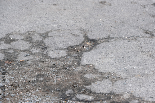 Destroyed asphalt pavement