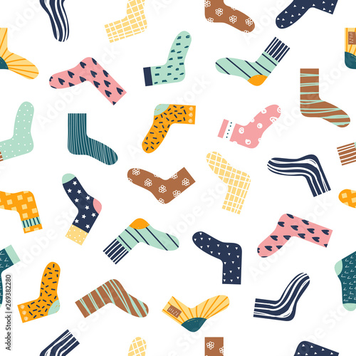 Seamless pattern with funny socks. Vector hand drawn illustration.