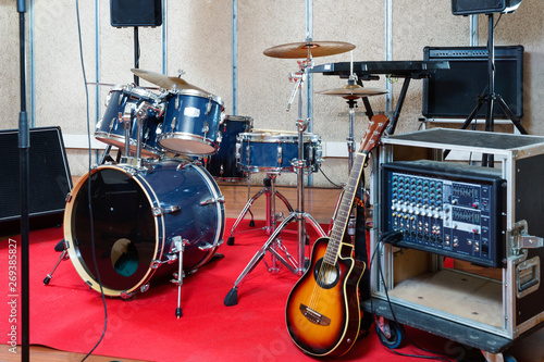 Obraz na plátne Set of musical instruments ready for rehearsal of music band in modern sound stu
