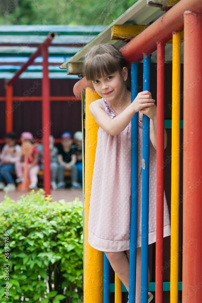 Girl on the playground in kindergarten Girl on the playground in kindergarten
