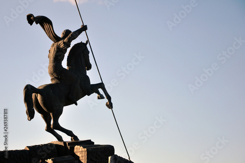 Monument to Saint George slaying a dragon. photo