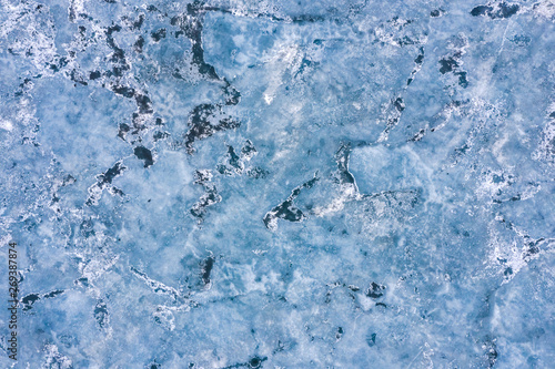 Aerial view of frozen lake. Drone view. Background texture concept.