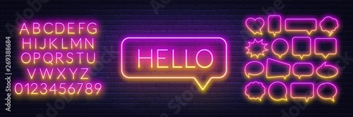 Neon sign of word hello in speech bubble frame on dark background.Set of neon speech bubbles and the alphabet on a dark background. Template for design.