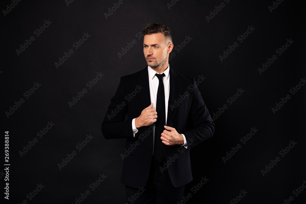 Portrait of his he nice-looking attractive chic gorgeous content luxurious guy financier executive director auditor attorney lawyer shark posing isolated over dark black background Portrait of his he nice-looking attractive chic gorgeous content luxurious guy financier executive director auditor attorney lawyer shark posing isolated over dark black background
