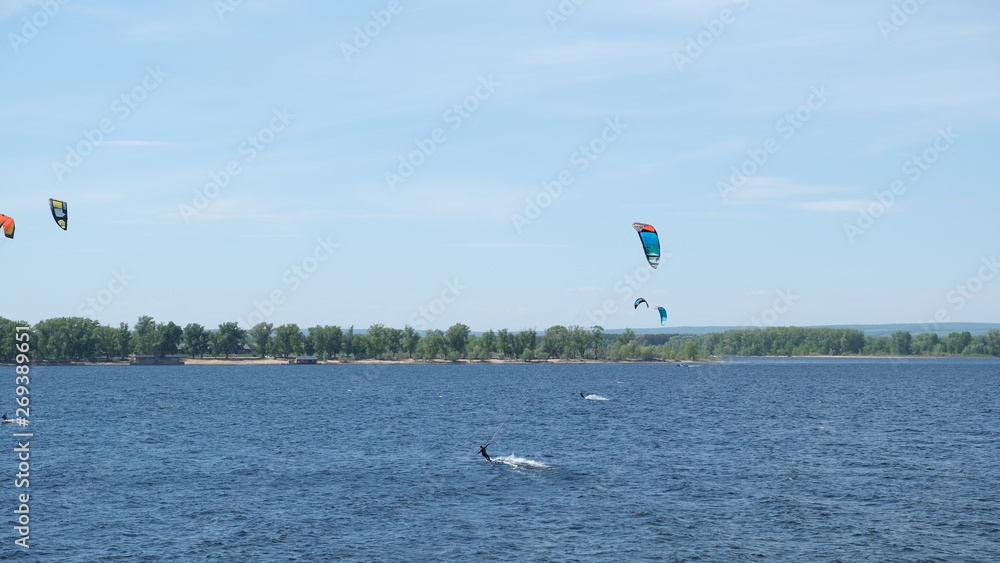 the Volga River, paragliding over the waves