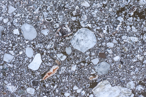 Принти на полотні Aierial view from the top down on ice floes floating on the river