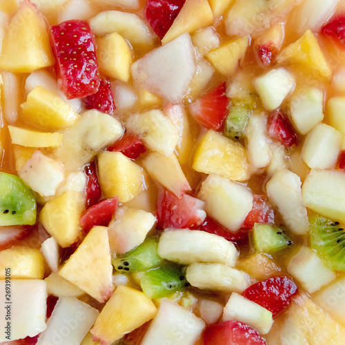 closeup of true organic fruit salad  squared shape of fresh food with juice