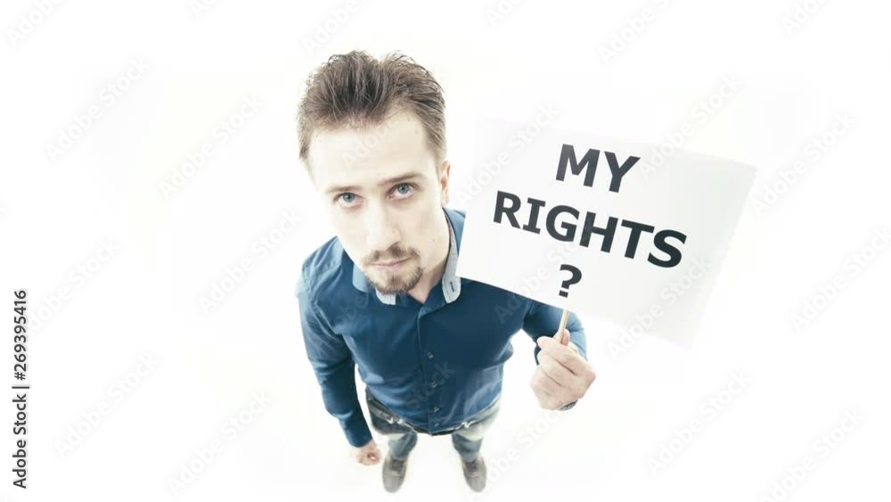 Man holding sign My Rights 4K. Extreme wide shot top view of person head in focus while pull up a sign. White background. Man holding sign My Rights 4K. Extreme wide shot top view of person head in focus while pull up a sign. White background.