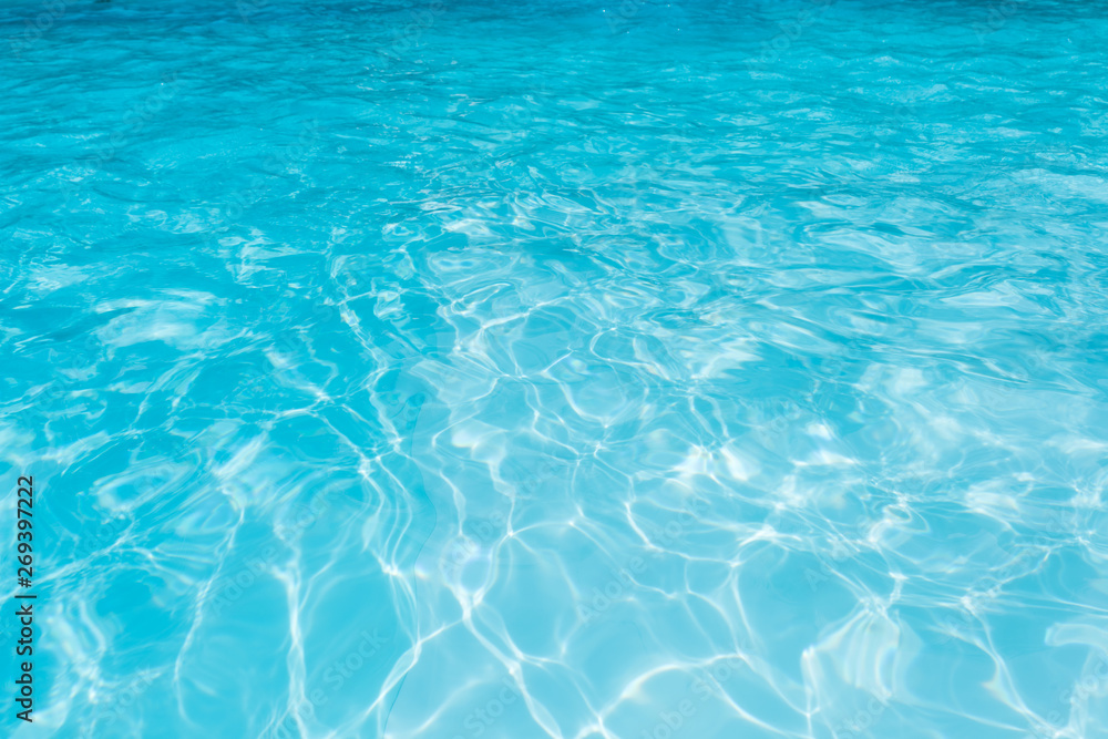 Blue water background in swimming pool