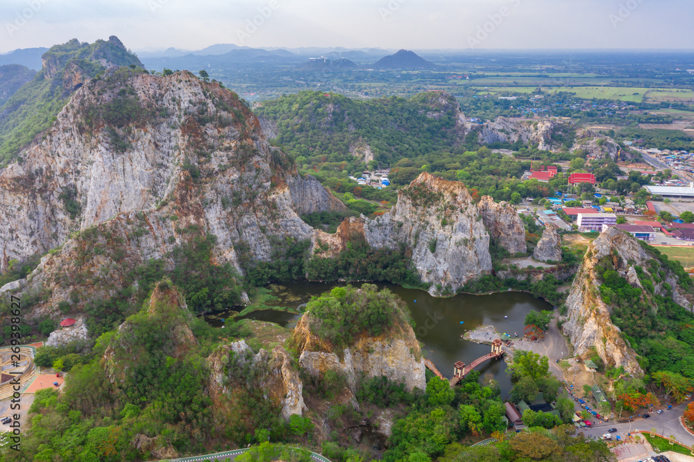 Fototapeta premium aerial over view khao ngoo mountain rock or snake mountain rock are high cliff and landmark ratchaburi province thailand