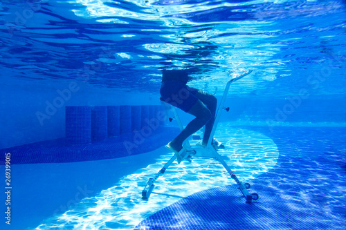Aerobics on the aquabike in the resort pool